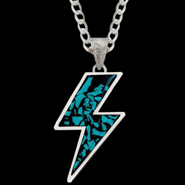 "Our Lightning Bolt Pendant are crafted by our expert craftsmen, featuring our signature crushed turquoise stone. Ready to be shipped next day! 

Pendant Size: 1.098”x 1.78”

Get a Sterling Silver chain at a discounted price when you buy our Ligh